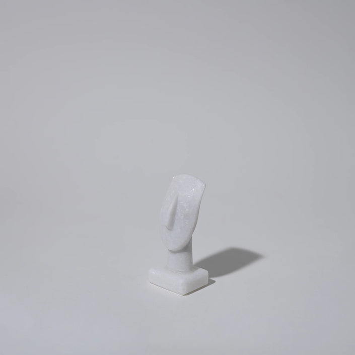 Close up of mini cycladic marble head sculpture 7cm