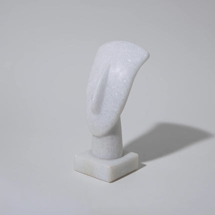Close up of oval cycladic marble head sculpture 13cm
