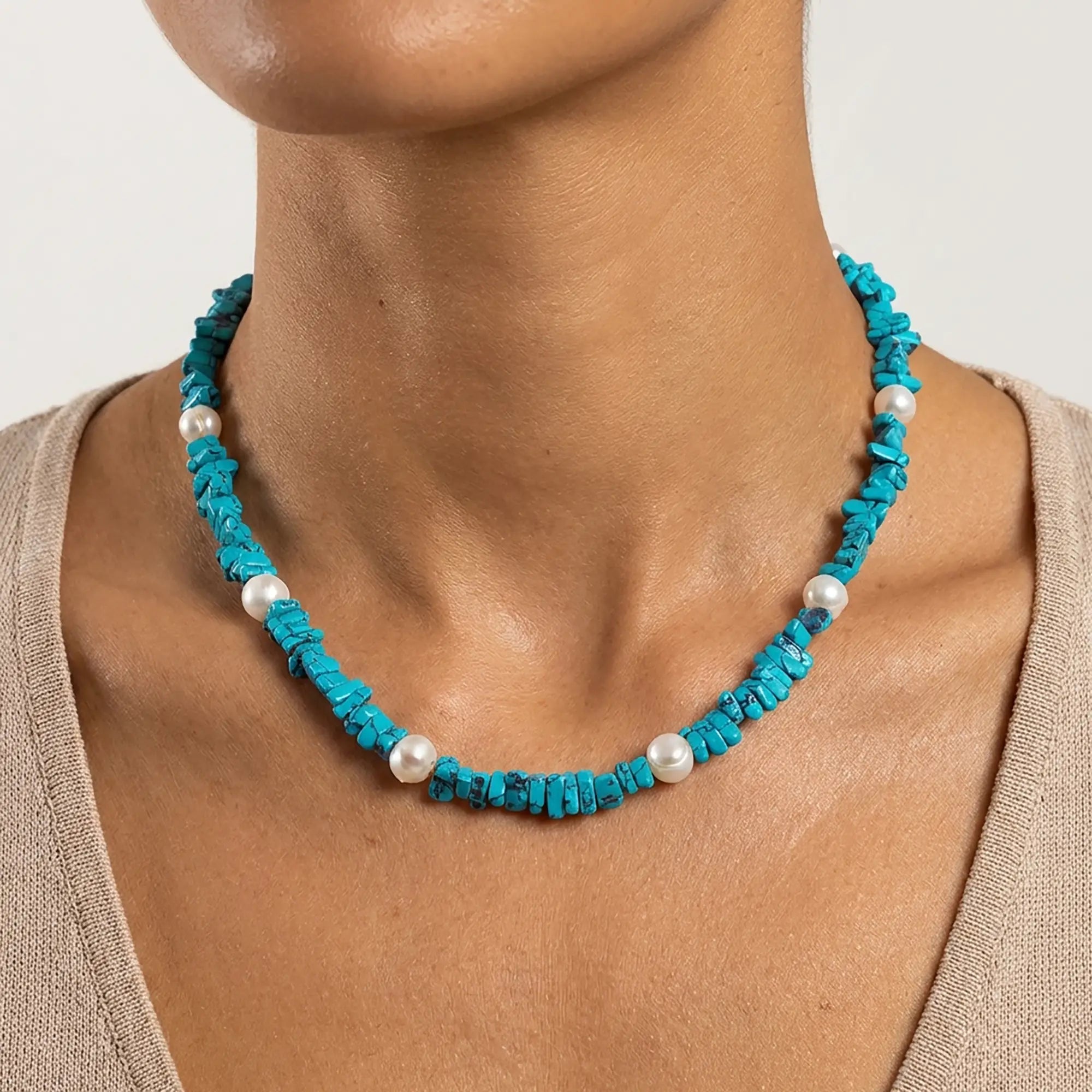 Close up of Oh, Coral turquoise necklace with pearl accents handcrafted in Greece
