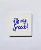 Close up of oh my greece coaster