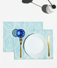 Close up of arc, set of 2 cotton-made, placemats in light blue