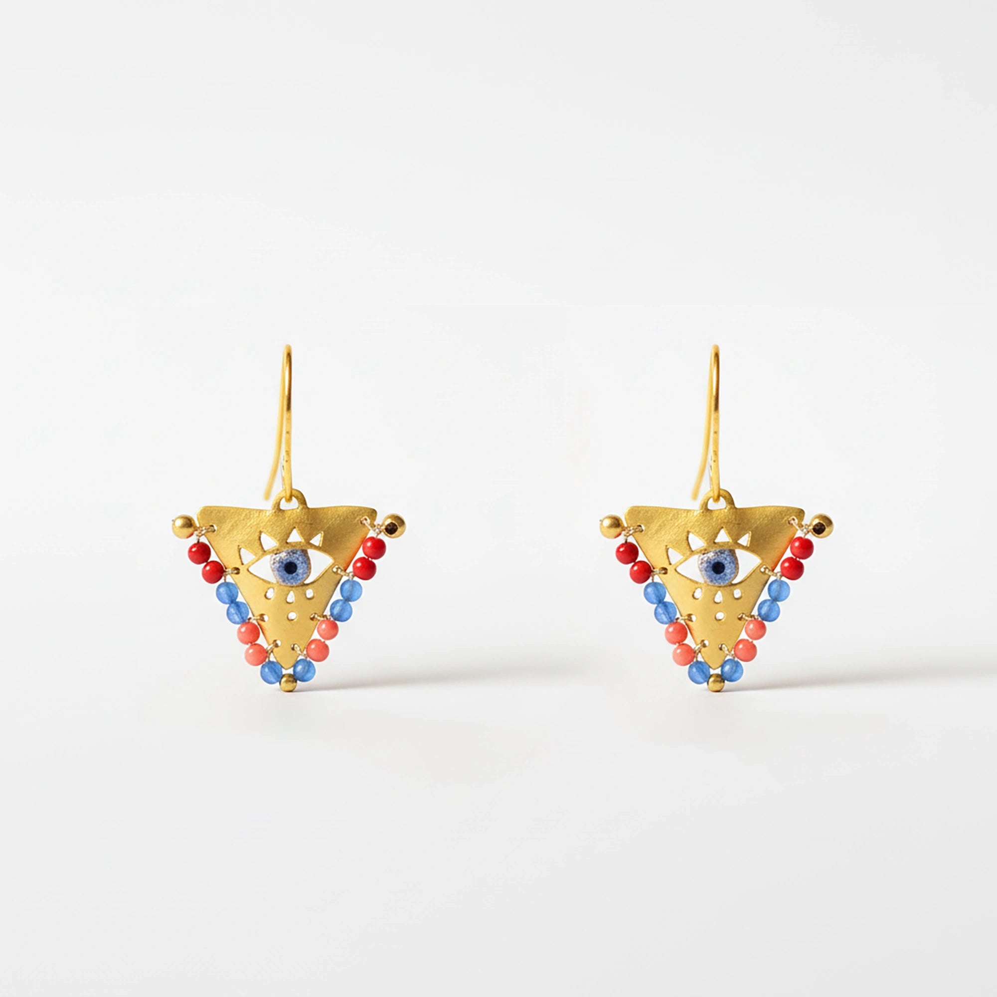 Medium Sunset Reef fylachto earring in gold plated sterling silver with handpainted eye and coral blue bead accents