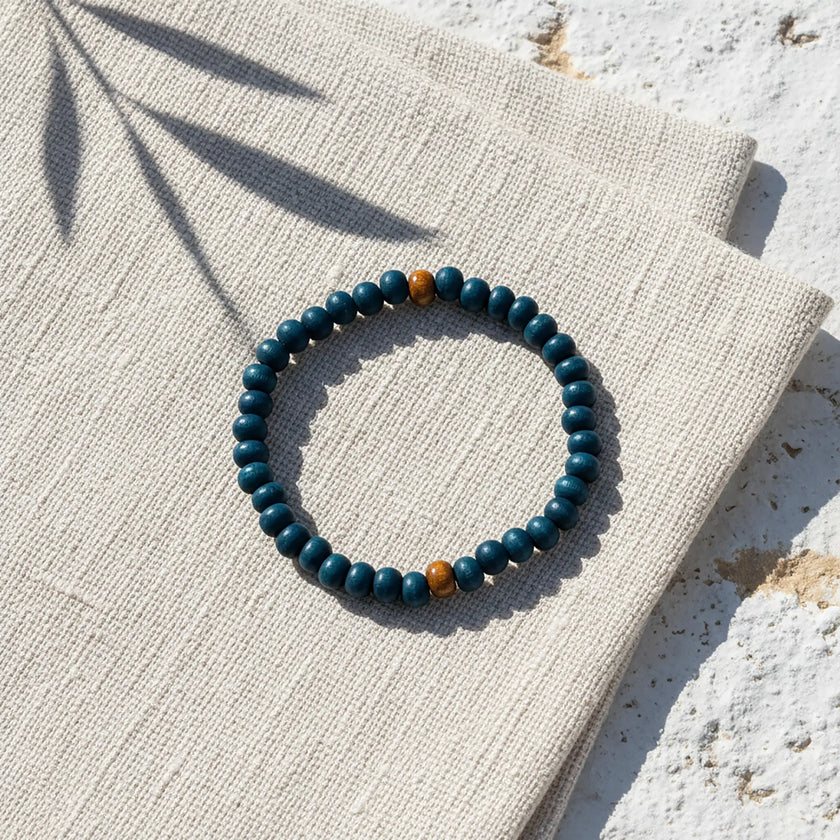 Handmade wooden bead bracelet from Naxos with deep blue beads and natural wooden accents