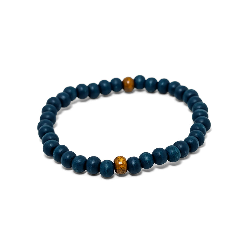 Stretch bracelet with deep blue wooden beads and warm natural wooden accent beads