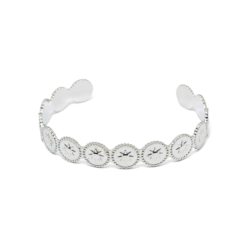 Stainless steel open cuff bracelet with repeating star medallions in silver tone