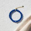 Handmade blue evil eye bracelet from Naxos with vivid blue beads and central mati bead