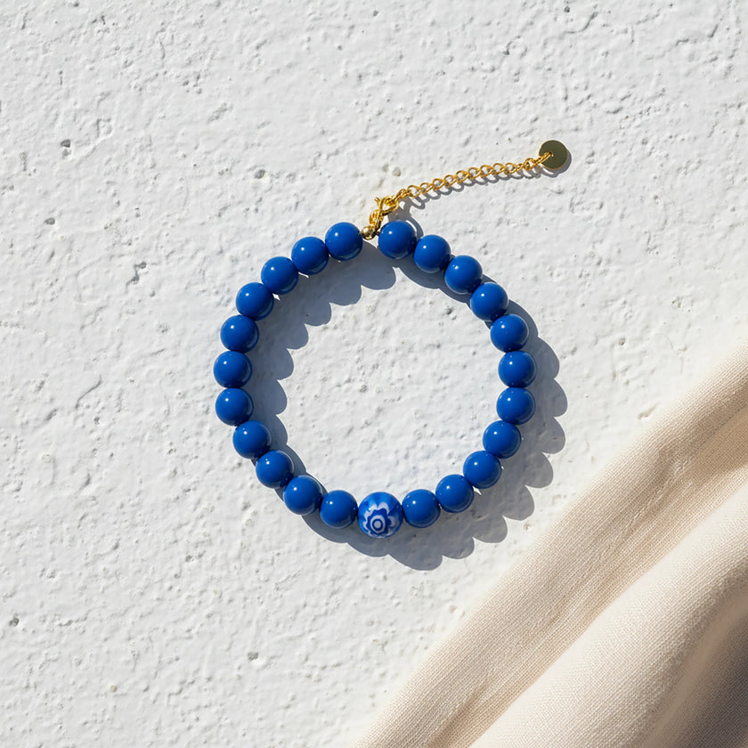 Handmade blue evil eye bracelet from Naxos with vivid blue beads and central mati bead