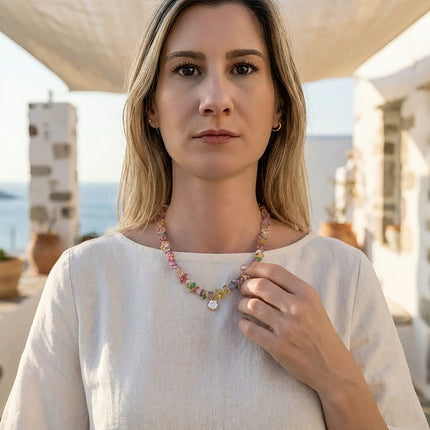 Drosia colourful stone chip necklace with pearl drop worn with linen top