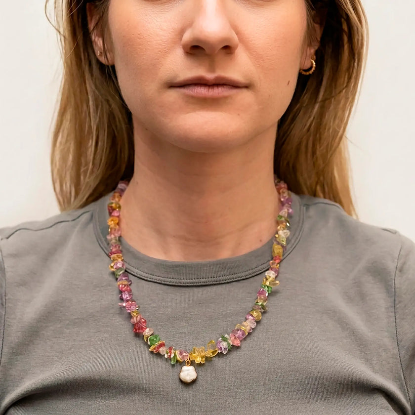 Drosia natural stone necklace with pearl drop worn with grey top