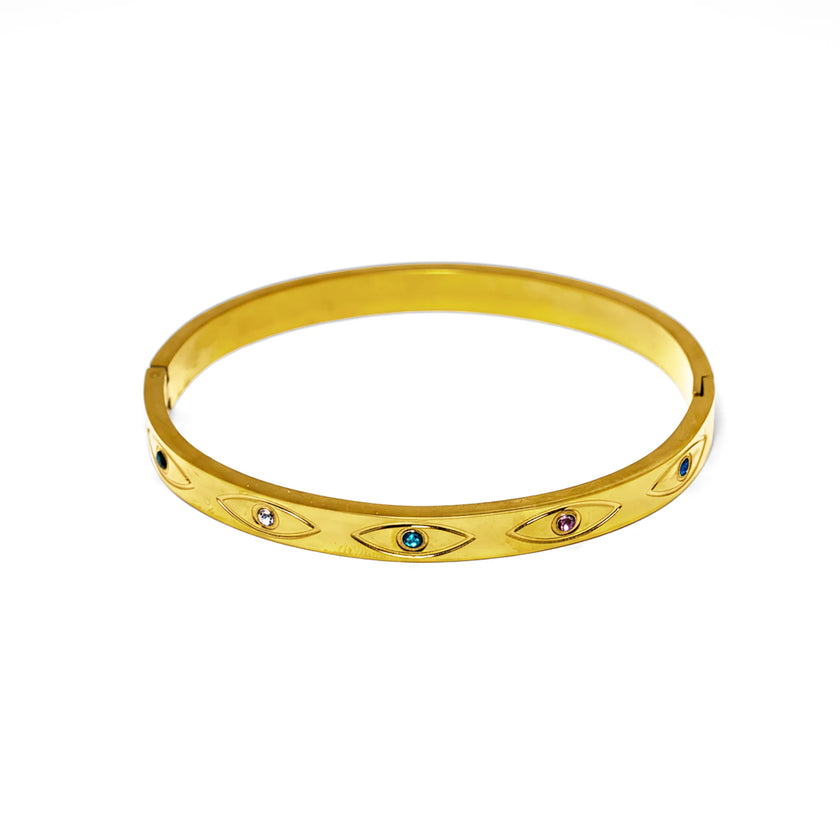 Gold tone stainless steel bangle bracelet with engraved evil eye pattern and blue, pink, and clear crystal details