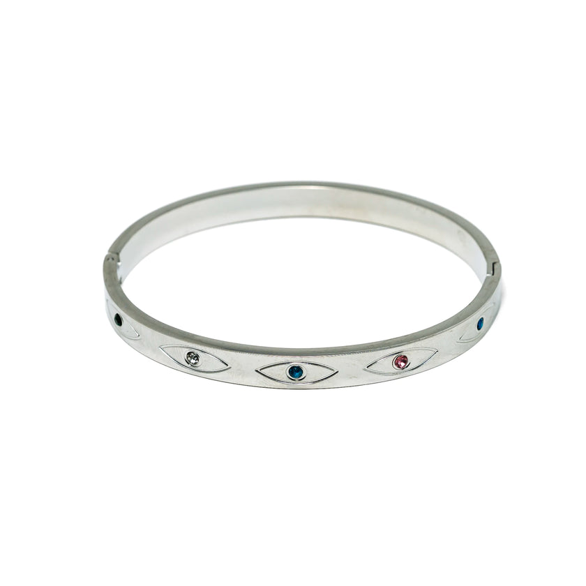 Stainless steel evil eye bangle bracelet with polished silver tone finish and crystal accents