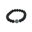 Stretch bracelet with black lava stone beads and symbolic tree of life centerpiece