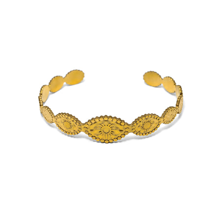 Open cuff bracelet in gold tone stainless steel with repeating oval embossed sun details