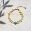 Handmade bracelet from Naxos with golden chip beads and blue Murano glass centerpiece