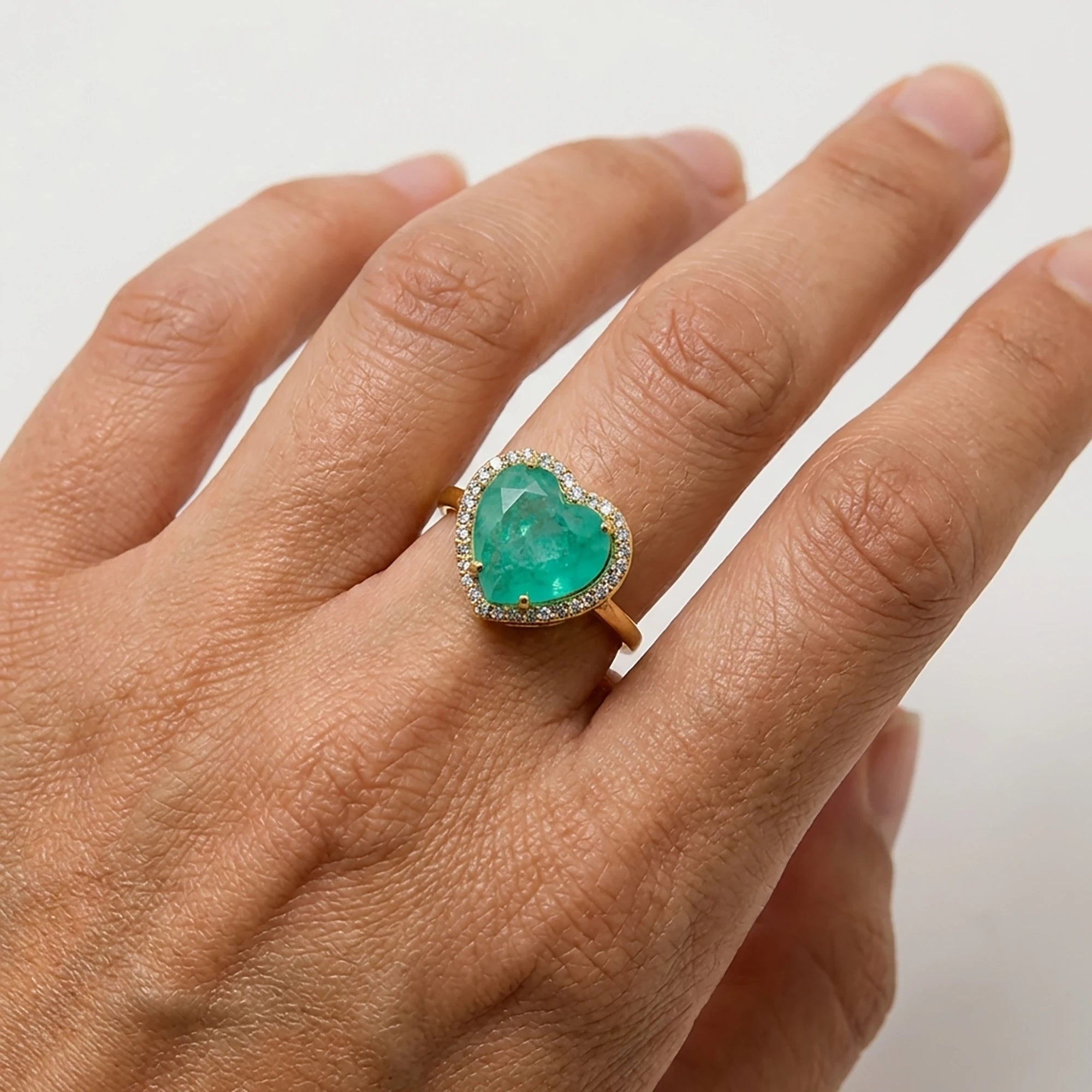 Close up of kardia aegean teal heart ring