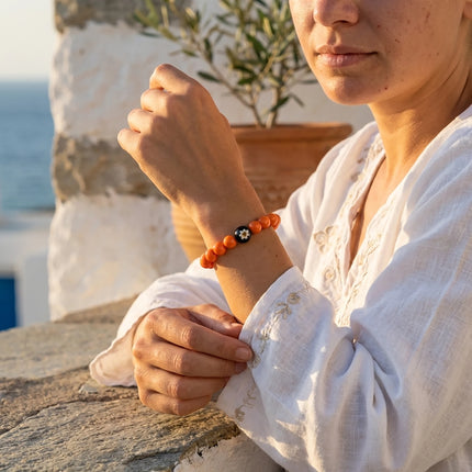 Close up of mati ilios bracelet with murano centerpiece