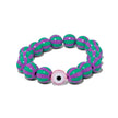 Stretch bracelet with lilac and green striped beads and pink evil eye centerpiece