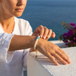terezas-naxos-pearl-evil-eye-bracelet-worn-lifestyle