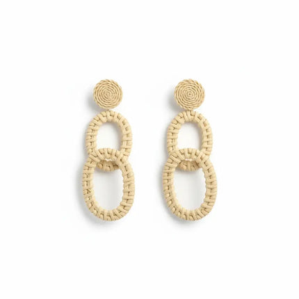 Handcrafted natural woven double oval earrings from Greece on a clean background