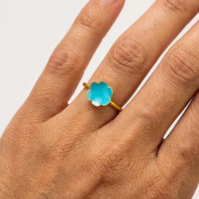 Close up of petrol green flower ring